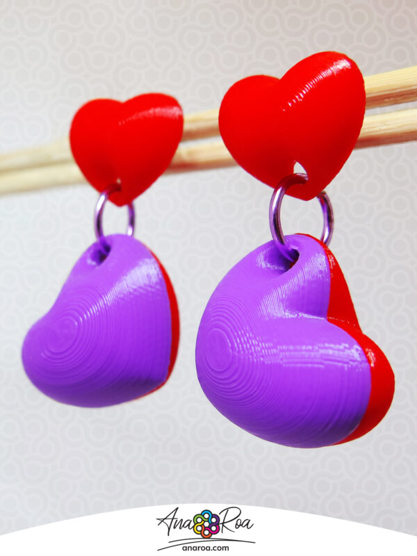 ARETES CORAZONES X2 ROJO MORADO