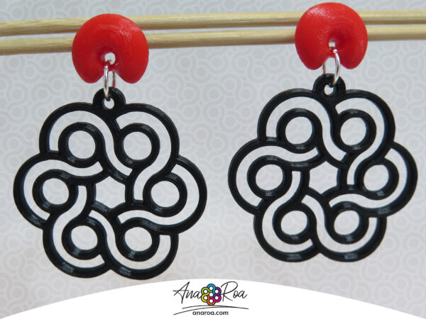 Diseño de aretes flor logo negro