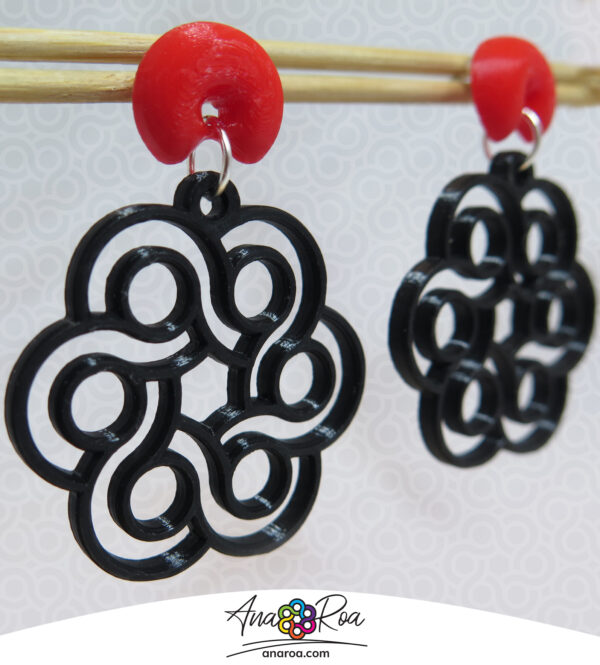 Diseño de aretes flor logo negro